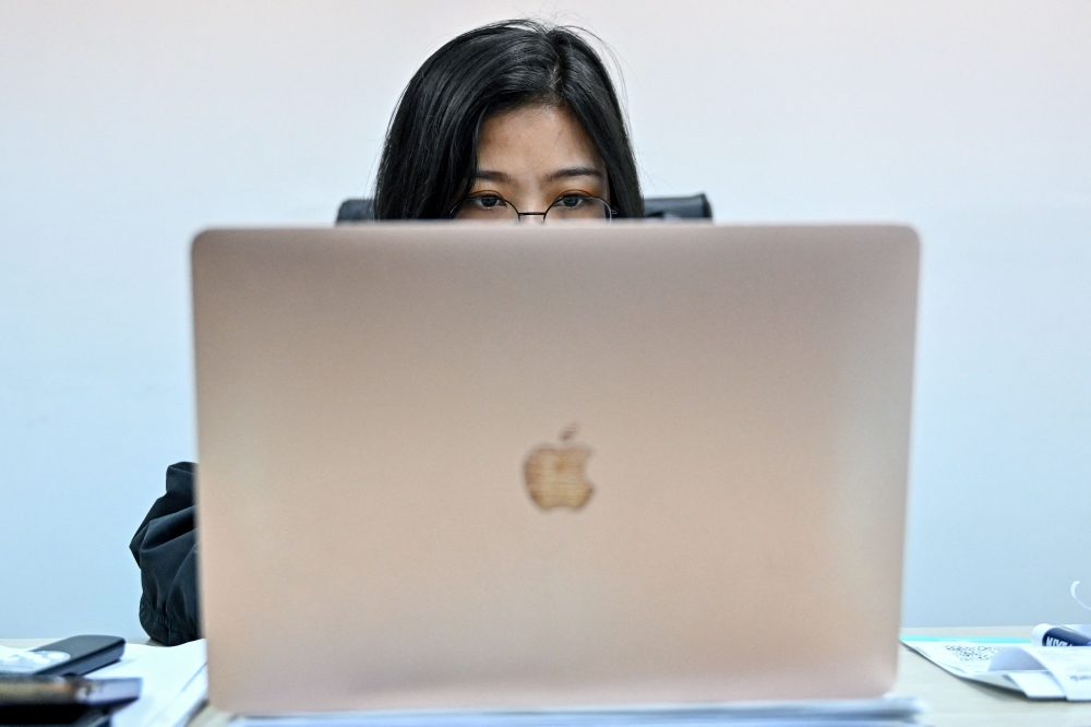 Vietnam has formally embraced the blockchain industry and is gradually asserting control over the estimated US$100 billion market. — AFP pic