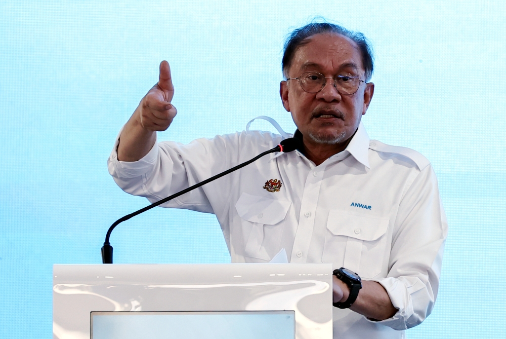 Prime Minister Datuk Seri Anwar Ibrahim said all district officers must submit reports on small projects in their respective areas to prevent delays at the implementation stage. — Bernama pic