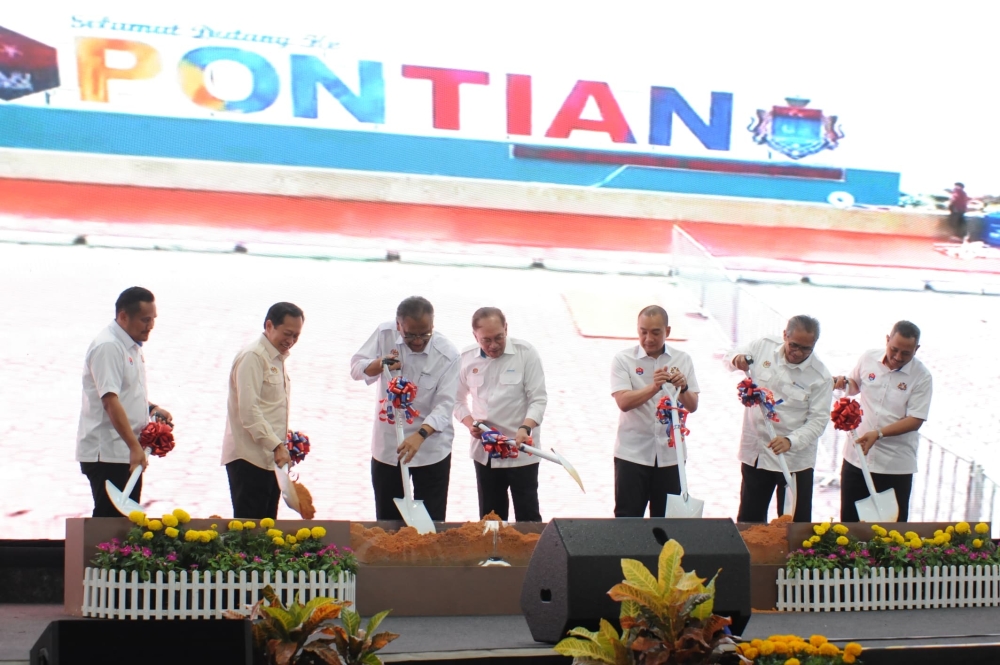 Prime Minister Datuk Seri Anwar Ibrahim (fourth from left) and Health Minister Datuk Seri Dzulkefly Ahmad (third from left) at the groundbreaking ceremony for the Hospital Pontian’s additional annex at Dataran Pontian in Pontian today. Feb 15, 2026. — Picture by Ben Tan