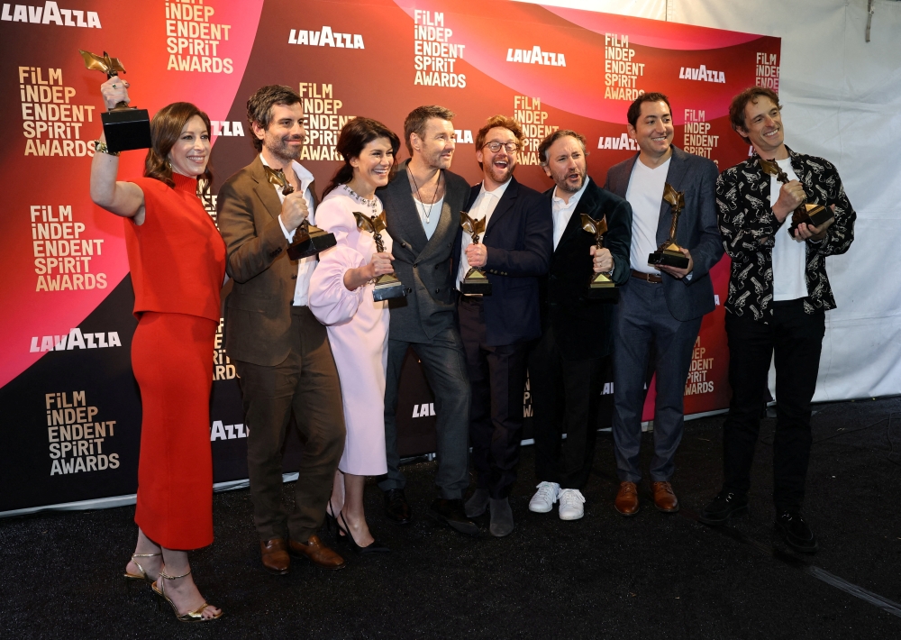 Adolpho Veloso, Ashley Schlaifer, Will Janowitz, Marissa McMahon, Clint Bentley, Michael Heimler, Teddy Schwarzman and Joel Edgerton pose with the awards for ‘Train Dreams’ during the Film Independent Spirit Awards at the Hollywood Palladium in Los Angeles, California February 15, 2026. — Reuters pic 
