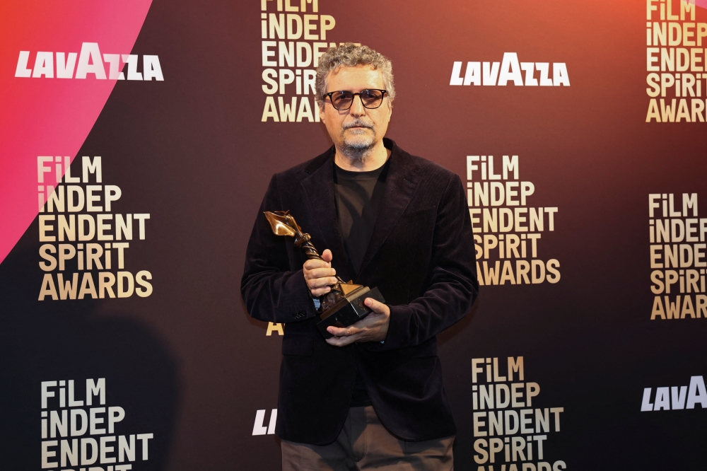 Best International Film award winner, Kleber Mendoca Filho, for ‘The Secret Agent’, holds his award during the Film Independent Spirit Awards at the Hollywood Palladium in Los Angeles, California February 15, 2026. — Reuters pic 
