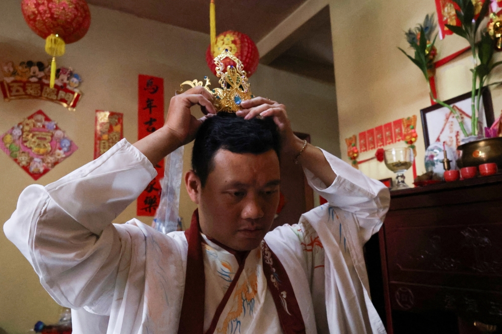 Head accessories are also part of the ‘hanfu’ attire owned by Chan Qi Yao, 33, who has more than 10 sets of ‘hanfu’ at Kampung Batu Papan 2. — Bernama pic  