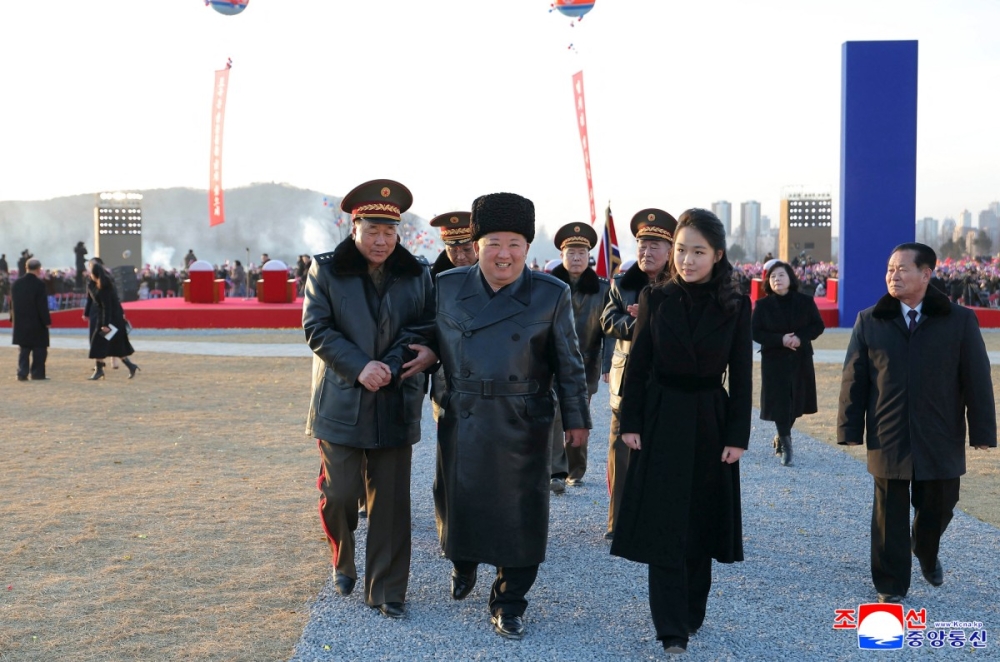 This picture taken on February 15, 2026 and released by North Korea's official Korean Central News Agency (KCNA) on February 16, 2026 shows North Korean leader Kim Jong Un (C) and his daughter Ju Ae (center R) attending the inauguration ceremony of Saeppyol Street in Pyongyang. — AFP pic 