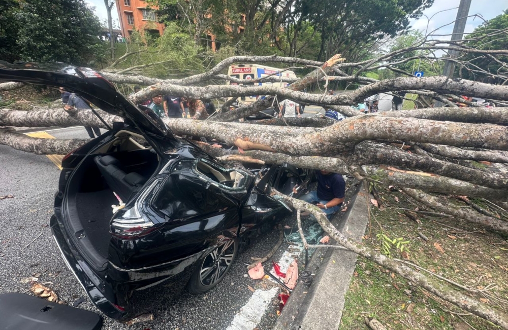 According to the Fire Department, the 39-year-old woman sustained injuries to her face and head, while the 42-year-old victim suffered injuries to her waist. — Picture from X/Bernama 