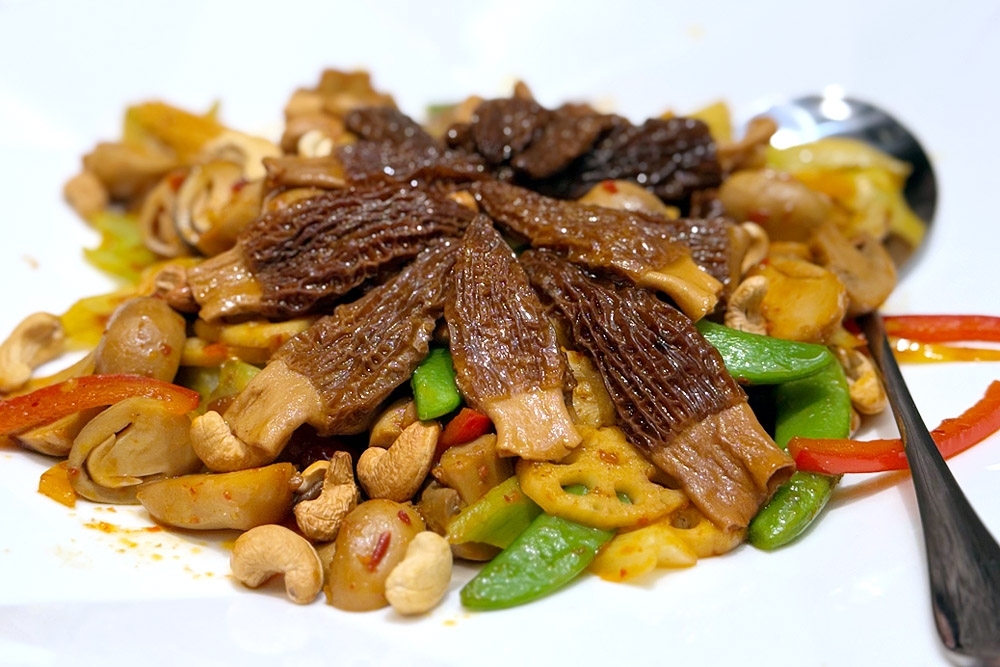 Spicy morels with stir fried mixed vegetables. — Picture by CK Lim
