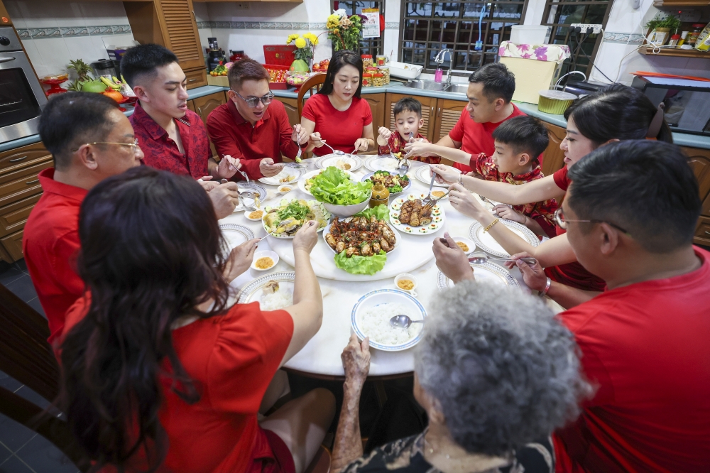 Woman entrepreneur Foo Pei Sun, 38, spends time at a reunion dinner event in conjunction with Chinese New Year with her siblings, parents and grandmother in Kuantan, February 16, 2026. — Bernama pic 