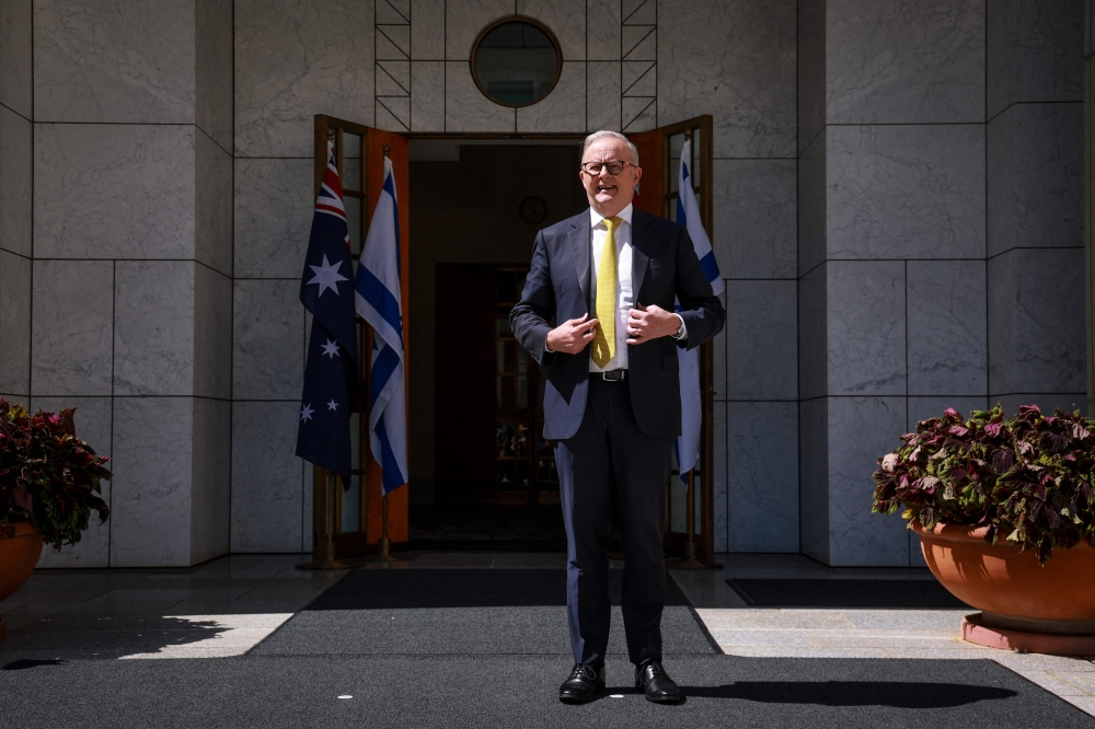 Prime Minister Anthony Albanese stands outside the entrance to his office at Parliament House in Canberra on February 11. — AFP pic