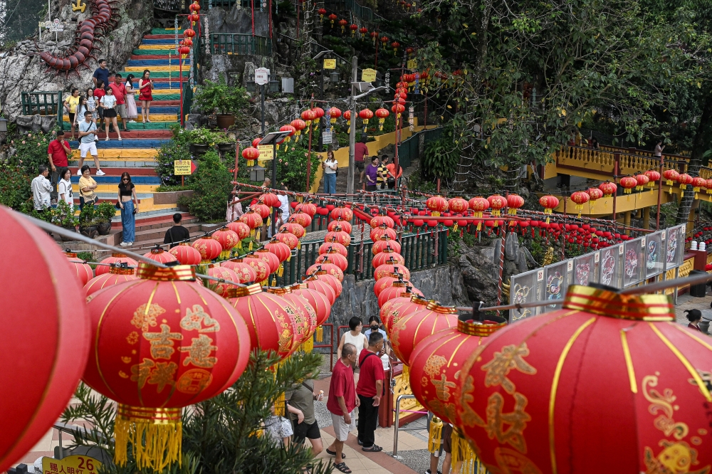 Members of the public take photographs after performing Chinese New Year prayers at Then Sze Koon Temple atop Bukit Wu Gong, Bukit Jung, Seremban, February 17, 2026. — Bernama photo