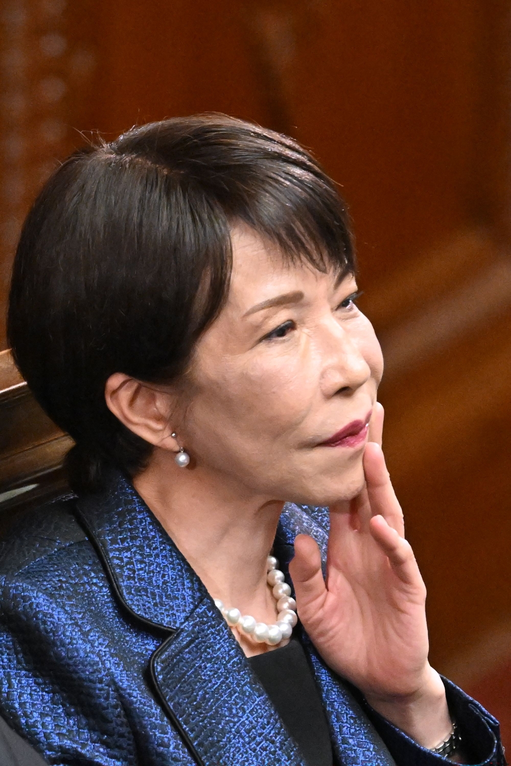 Japan's Liberal Democratic Party (LDP) President Sanae Takaichi attends the plenary session of the Lower House of Parliament in Tokyo, today.  — AFP pic