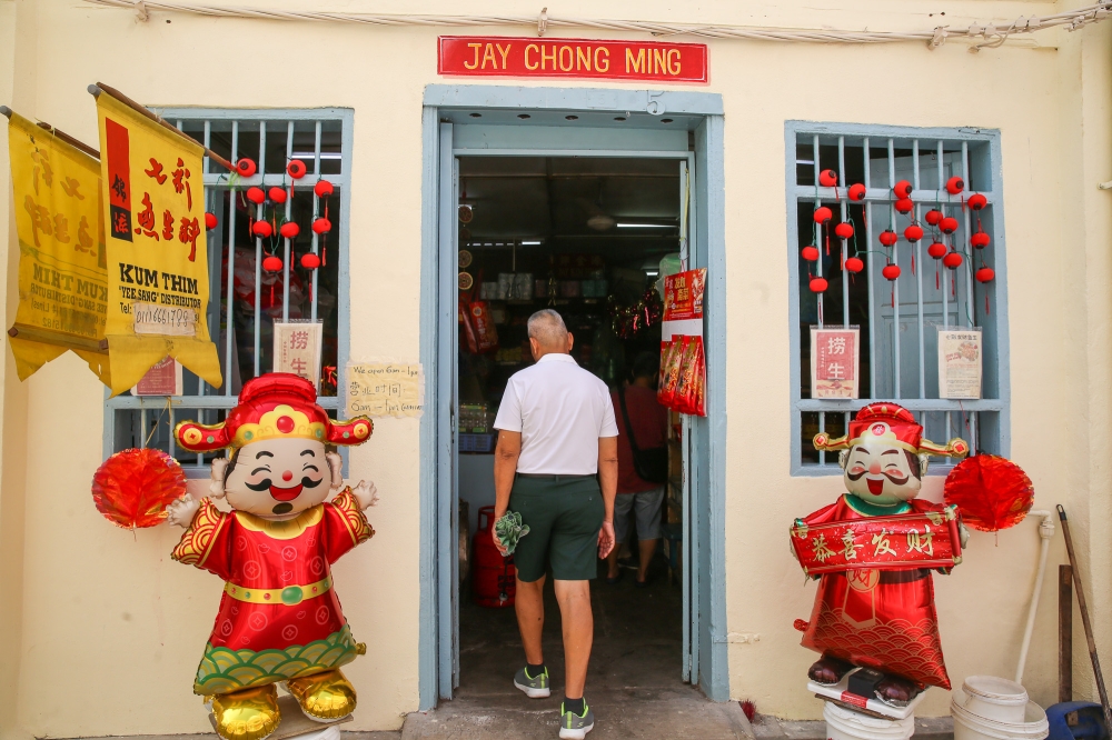 One of the newly spruced up shops along Jalan Sang Guna... all ready for Chinese New Year. — Picture by Choo Choy May