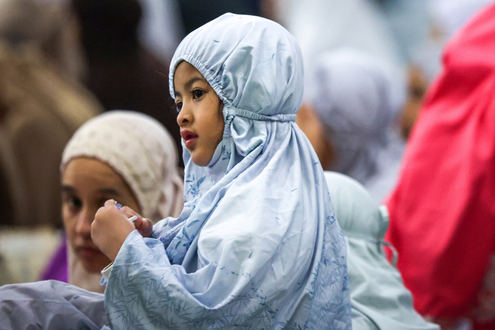 The antics of children stole the spotlight as congregants performed the first tarawih prayers of Ramadan at the National Mosque today, adding warmth and cheer to the evening worship atmosphere. — Bernama pic