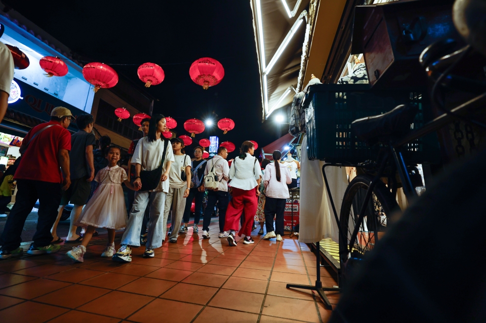 Festivities are wonderful but I guess being interrogated on some of the personal aspects and decisions in one’s life in the middle of one’s entire clan can be daunting. — Bernama pic