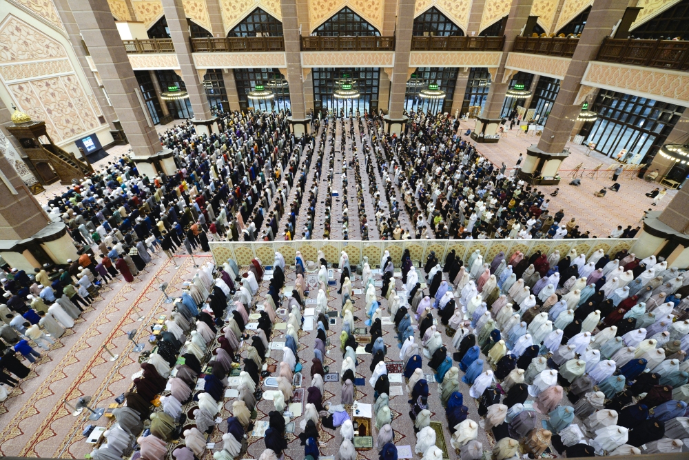 Muslims perform the first Tarawih prayers of Ramadan 1447H at Masjid Putra yesterday. The solemn atmosphere marked the arrival of the holy month, with Muslims nationwide set to begin fasting — the third pillar of Islam — today. — Bernama pic