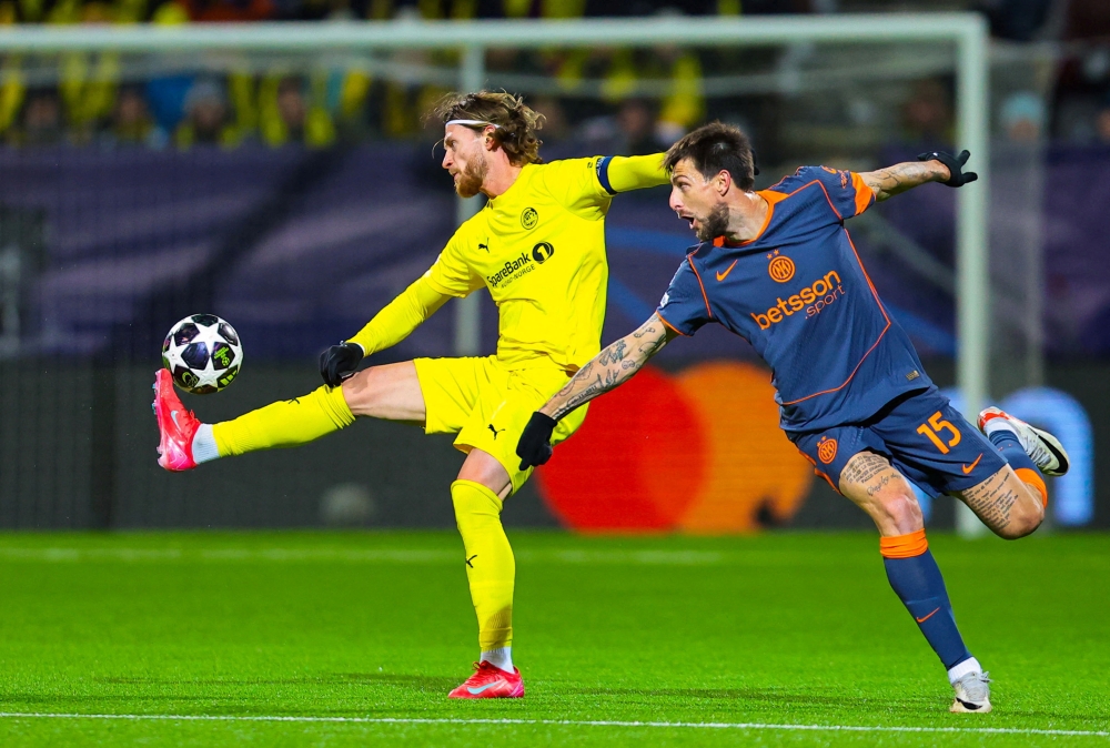 Bodo/Glimt’s Kasper Hogh in action with Inter Milan’s Francesco Acerbi at Aspmyra Stadion, Bodo, Norway, February 18, 2026. — NTB handout pic via Reuters 