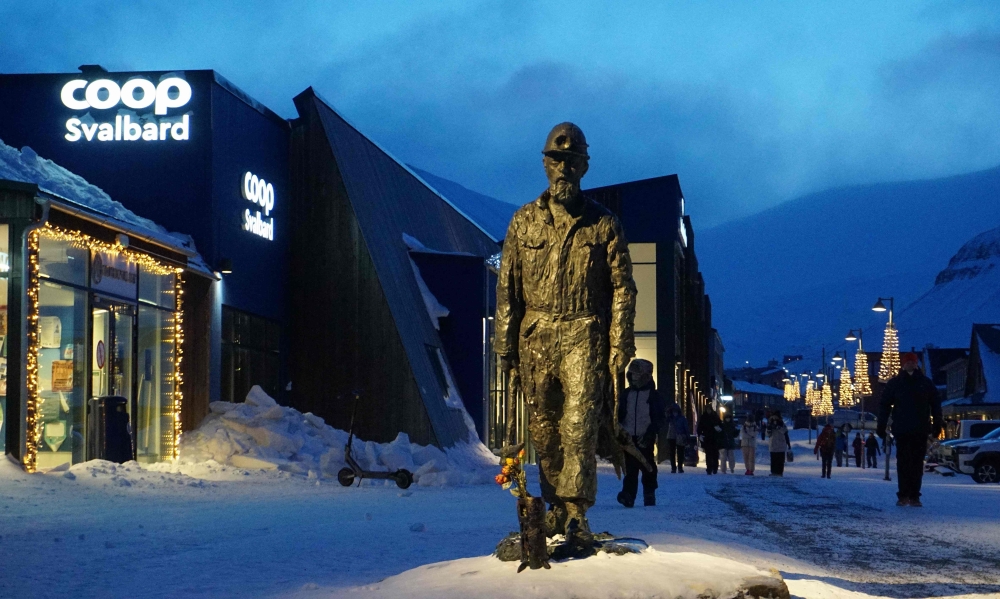 A statue pays tribute to the town's mining past in front of the archipelago's only supermarket in Longyearbyen on the Norwegian archipelago of Svalbard on February 17, 2026. — AFP pic
