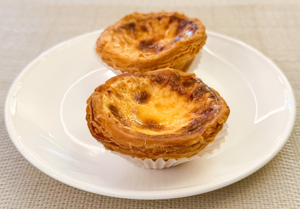 Crispy Portuguese egg tarts with a silky egg custard centre can be relished at Sri Eurasian Cuisine. — Pictures by Lee Khang Yi