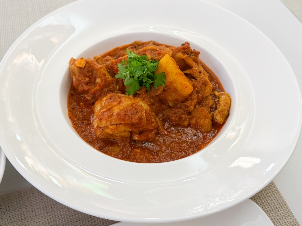 Debal Curry Chicken is an iconic Eurasian dish, usually served during celebrations with a slight tangy flavour from the use of vinegar. 