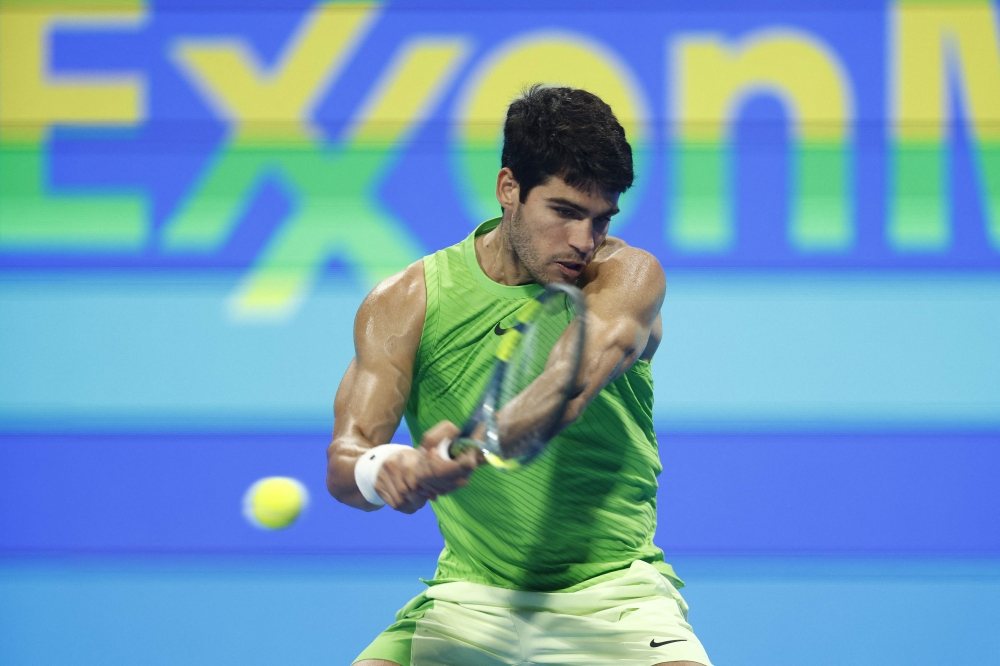 Russia’s Karen Khachanov hits a return against Spain’s Carlos Alcaraz during their men’s singles quarterfinal match at the Qatar Open tennis tournament in Doha on February 19, 2026. — AFP pic 