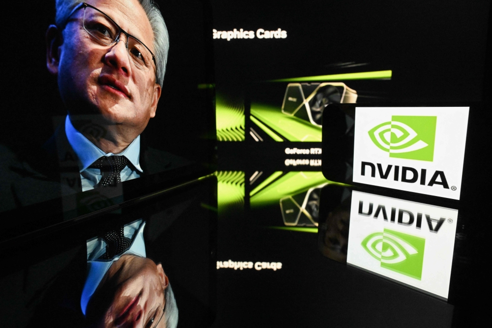 Nvidia chief executive Jensen Huang has insisted that the US tech giant will make a ‘huge’ investment in OpenAI and dismissed as ‘nonsense’ reports that he is unhappy with the generative AI star. — AFP pic 