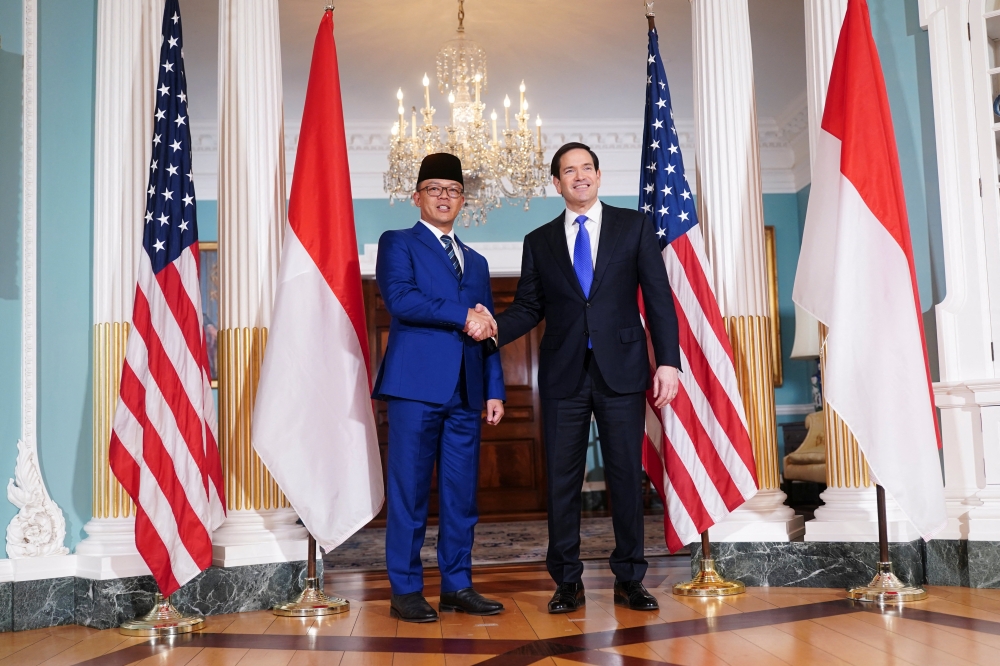US Secretary of State Marco Rubio shakes hands with Indonesian Foreign Minister Sugiono at the State Department in Washington, DC, February 19, 2026. The US and Indonesia finalised a trade deal that locks in tariff rates and non-tariff barriers to commerce, the White House announced Thursday. — Reuters pic 