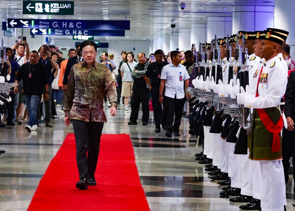 Singapore Prime Minister Lawrence Wong arrives at Kuala Lumpur International Airport (KLIA) Terminal 1 for a special visit to Malaysia today. — Bernama pic