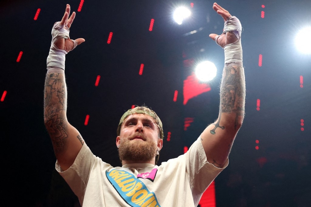 Jake Paul gestures during the ‘Jake Paul v Anthony Joshua — Fighter Showcase & Open Workout’ in Miami, December 16, 2025. — AFP pic