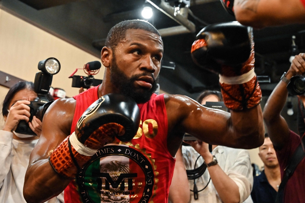 US boxer Floyd Mayweather takes part in a training session at a gym in Tokyo September 22, 2022, ahead of his planned exhibition boxing match against Japanese mixed martial artist Mikuru Asakura on September 25. — AFP pic