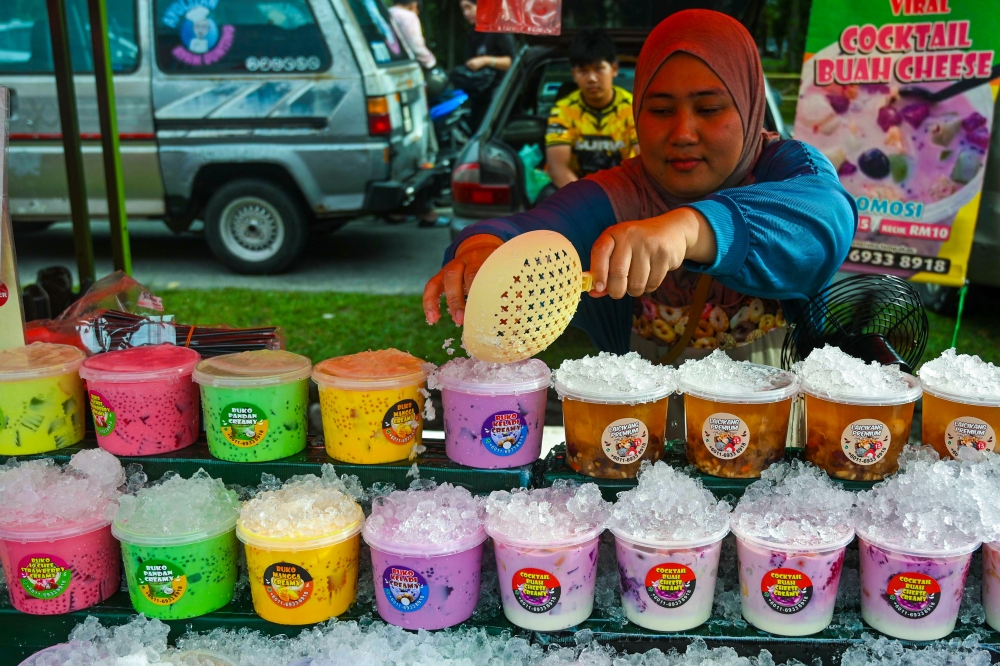 Cold and refreshing fruit cocktails sit temptingly on display at the Bandar Baru Ampang Ramadan bazaar in Kuala Lumpur February 20, 2026. — Bernama pic