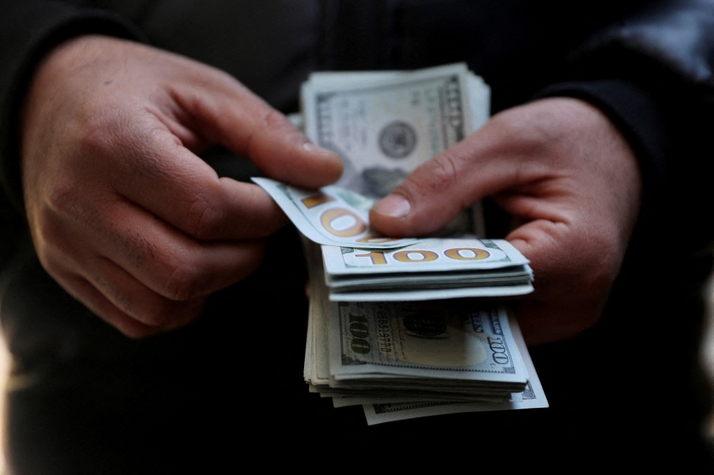 The US Supreme Court said yesterday that tariffs imposed by President Donald Trump under an economic emergency law were illegal. The court did not say how the government should refund the illegal tariffs, worth an estimated US$175 billion (RM683 billion). — Majid Asgaripour/Wana (West Asia News Agency) pic via Reuters