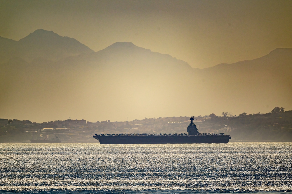 USS Gerald R. Ford aircraft carrier in the sea waters as seen from Gibraltar, with Northern Africa in the background, February 20, 2026 in this picture obtained from social media. — @dparody/Instagram pic via Reuters