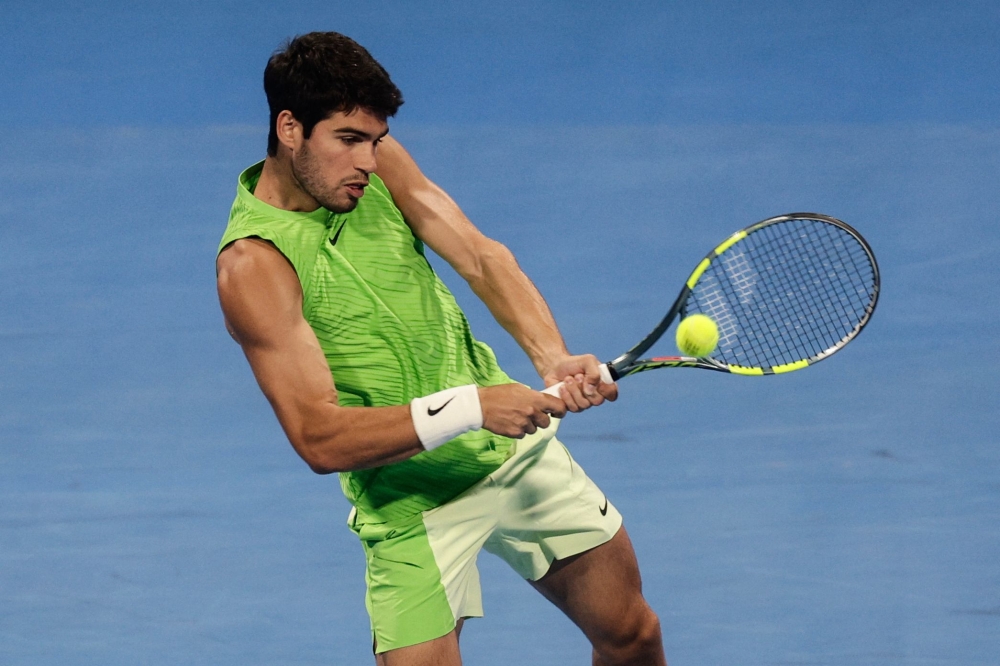Spain’s Carlos Alcaraz returns a shot against France’s Arthur Fils during the men’s singles final at the Qatar Open in Doha, February 21, 2026. — AFP pic