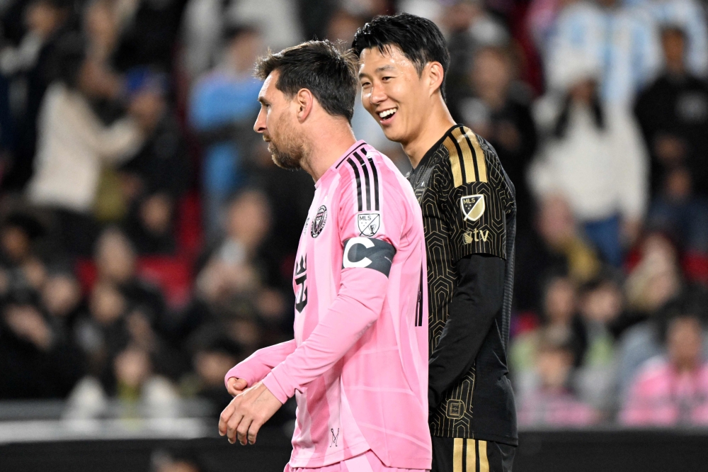 Son Heung-min (right) of Los Angeles FC speaks with Lionel Messi of Inter Miami CF during their MLS match at the Los Angeles Memorial Coliseum in Los Angeles, California, February 21, 2026. — AFP pic
