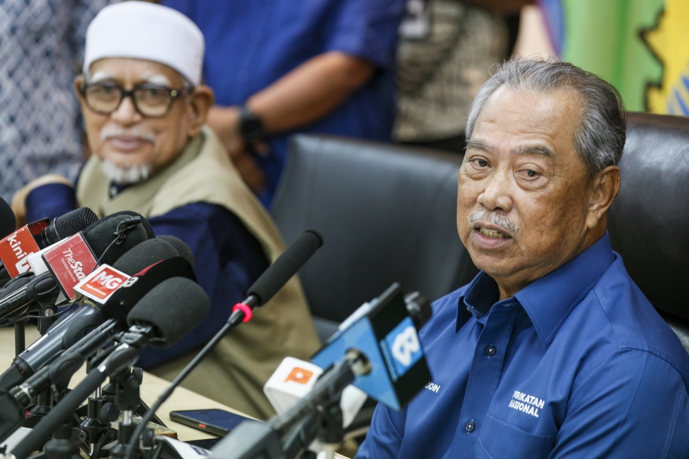 Tan Sri Muhyiddin Yassin and Tan Sri Abdul Hadi Awang at a press conference in Kuala Lumpur. The announcement signals a recalibration within Perikatan Nasional’s top ranks following Datuk Seri Ahmad Samsuri Mokhtar’s appointment as chairman. — Picture by Hari Anggara