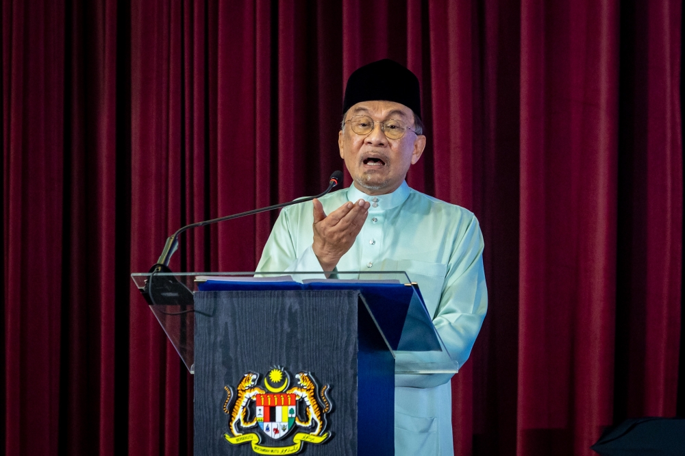 Prime Minister Datuk Seri Anwar Ibrahim speaks during the launch of the Rakan Masjid X Rakan Muda Ramadan programme and a breaking-of-fast event at the Federal Territory Mosque in Kuala Lumpur on February 22, 2026. —  Picture by Firdaus Latif