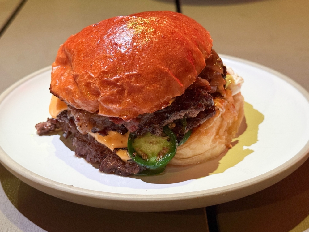 Creamy Jalapeno Burger is a medley of whipped cream cheese, onion raspberry beef bacon jam and a beef patty studded with jalapeno.—Picture by Lee Khang Yi