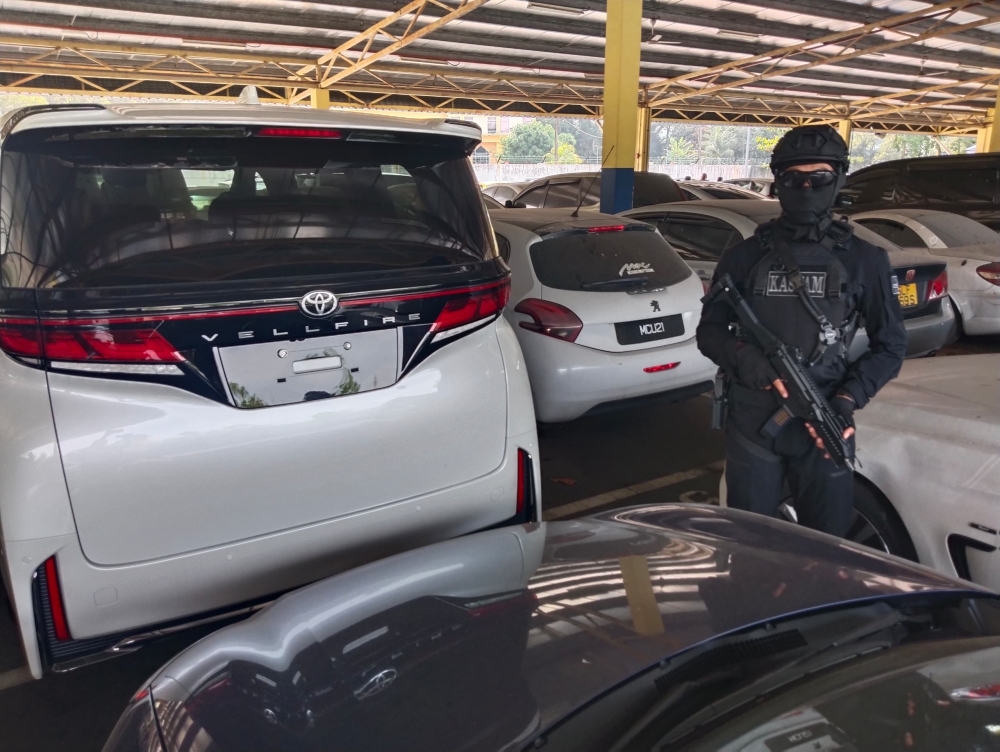 A Toyota Vellfire multipurpose vehicle was among the luxury vehicles seized from an imported car shop during Ops Terma on February 23, 2026. — Picture by Ben Tan