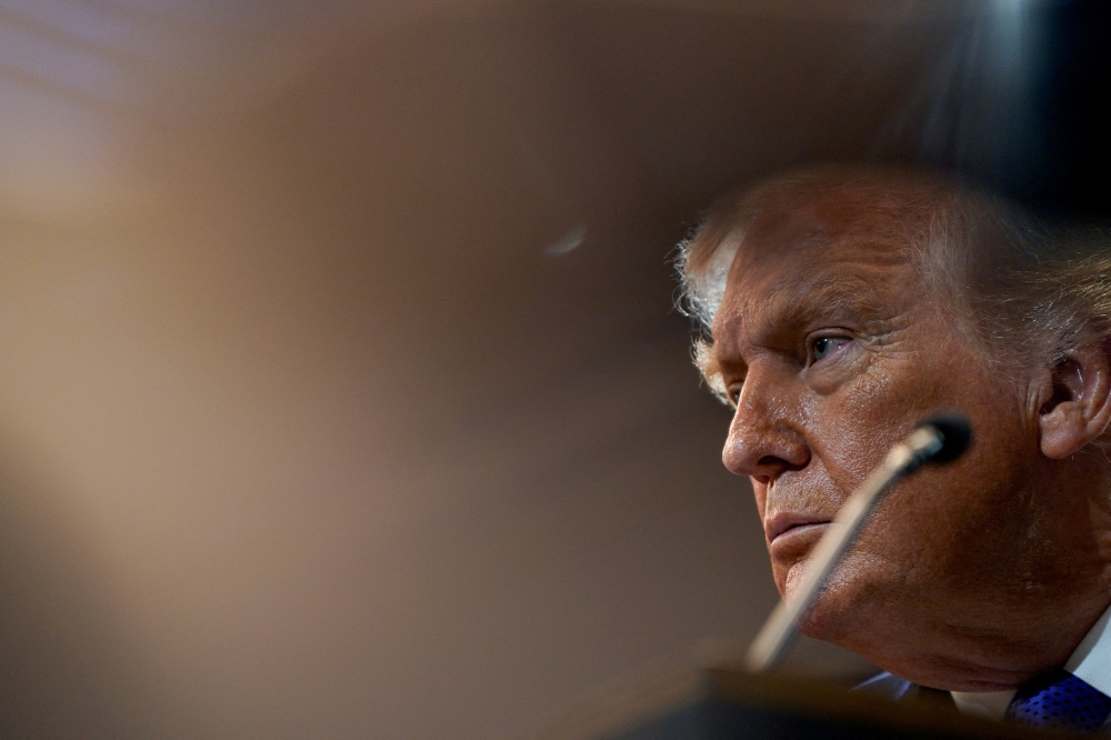 The Supreme Court decision has forced Trump to reconsider his trade strategy, prompting warnings from businesses bracing for renewed volatility. — Reuters pic