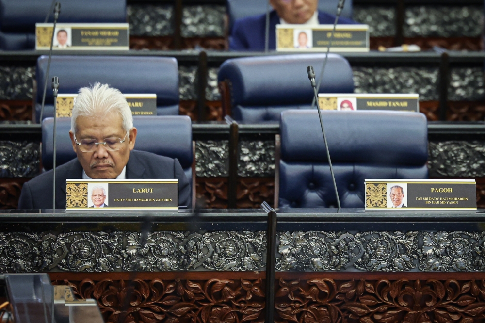 Larut MP and former Bersatu deputy president Datuk Seri Hamzah Zainuddin attends the first meeting of the fifth session of the 15th Parliament at Parliament House in Kuala Lumpur on February 23, 2026. — Bernama pic