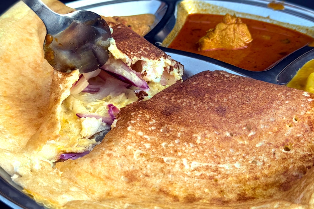 Egg and onion ‘thosai’. — Picture by CK Lim