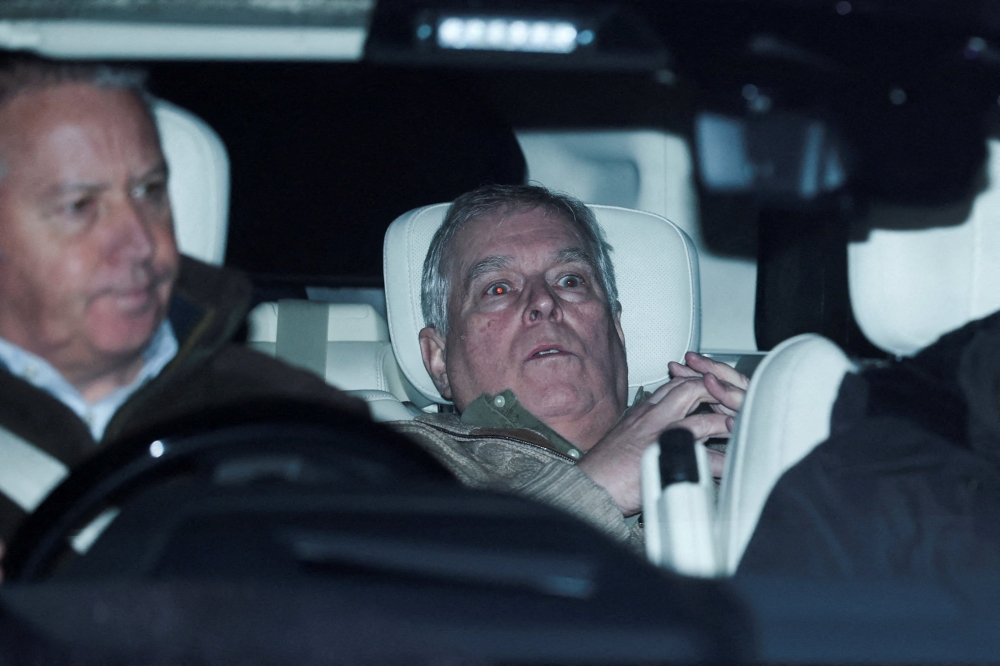 Andrew Mountbatten Windsor, younger brother of Britain’s King Charles, formerly known as Prince Andrew, leaves Aylsham Police Station on a vehicle, on the day he was arrested on suspicion of misconduct in public office, after the US Justice Department released more records tied to the late financier and convicted sex offender Jeffrey Epstein, in Aylsham, Britain, February 19, 2026. — Reuters pic