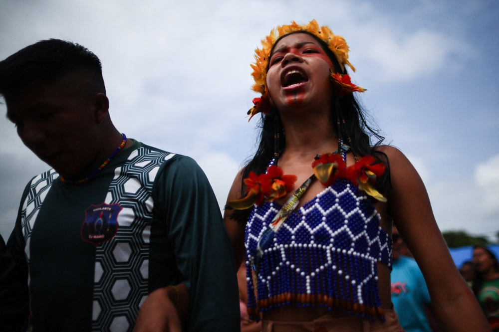 Indigenous people take part in a ritual as they occupy the Cargill’s Santarem port terminal, to protest against plans to dredge the Tapajos river and move more grains like soy and corn destined for export markets, in Santarem, Brazil, February 23, 2026. — Reuters pic 