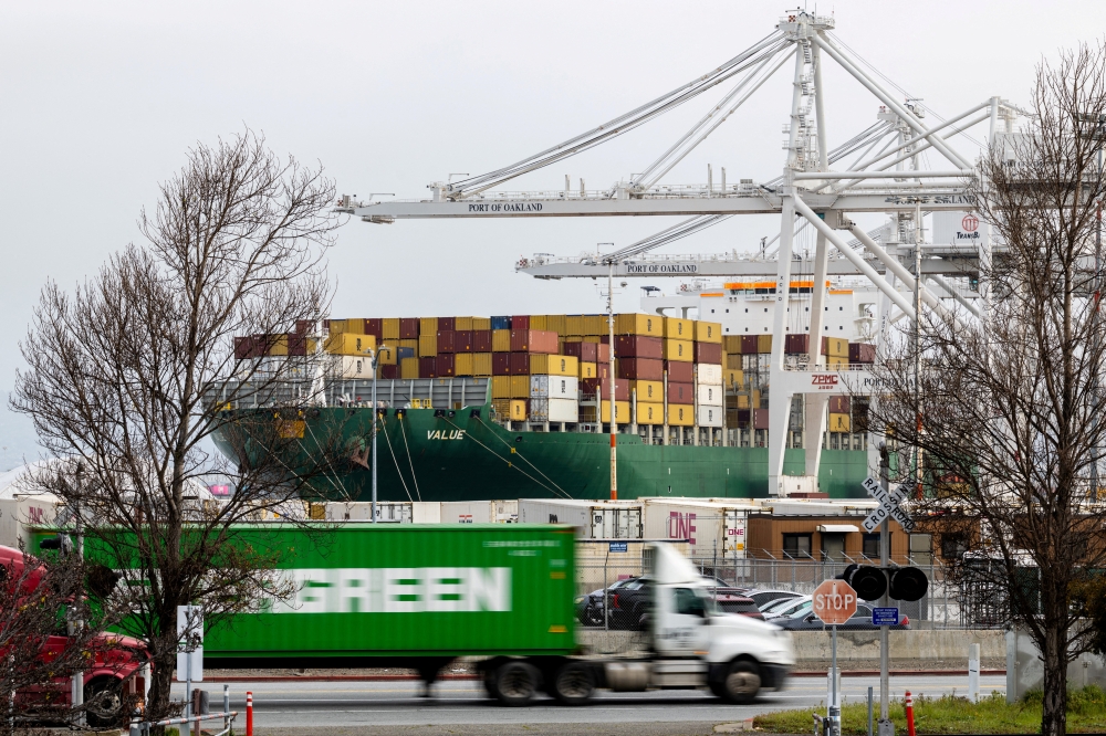 A view of cargo ship with shipping containers at the port of Oakland following the Supreme Court’s ruling that Trump had exceeded his authority when he imposed tariffs, in Oakland, California, February 23, 2026. — Reuters pic 