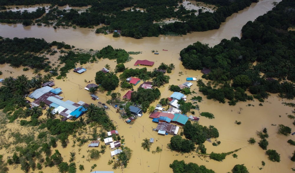 An aerial view of flooded Paitan on February 21, 2026. Three days on, the same number of 2,071 residents are still camped out at evacuation shelters due to the severe stormy weather. — Bernama pic