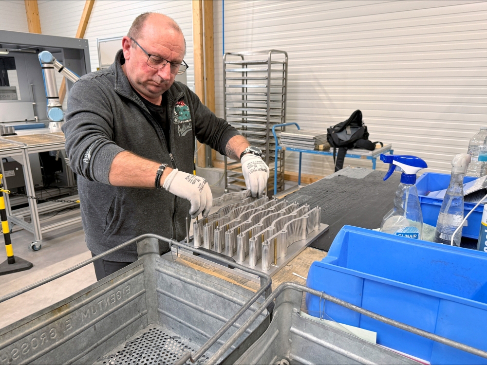 A worker operates machinery at the production facility of Dostech GmbH in Moessingen, Germany, February 10, 2026. — Reuters pic