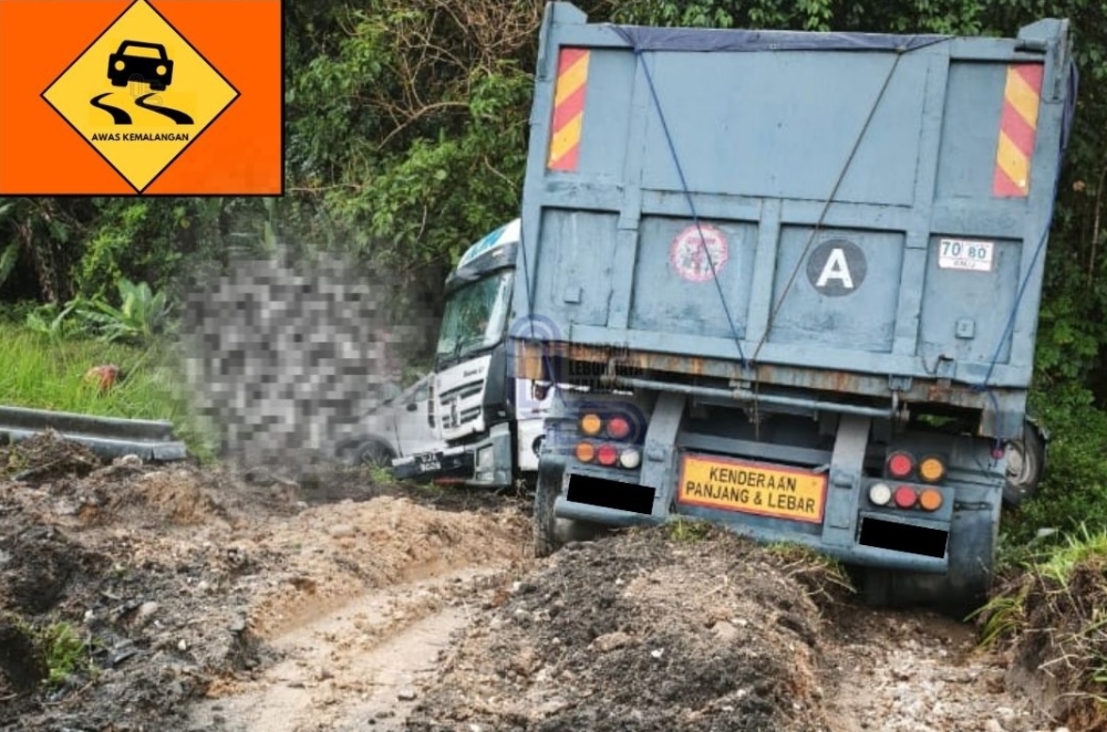Authorities said the crash at KM314 involved a trailer carrying stones, a Lexus and a BMW, leaving one woman dead and two men injured. — Picture via Facebook/Lembaga Lebuhraya Malaysia