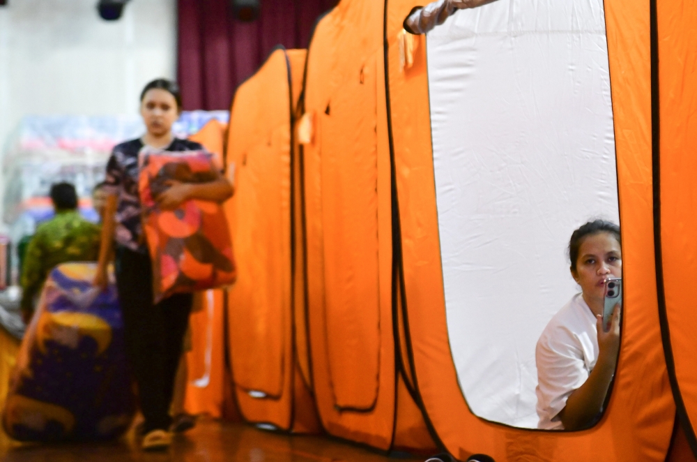 Flood victims take shelter at the Dewan Serbaguna Ranchan temporary relief centre in Serian, Sarawak on January 10, 2025. The Sabah State Disaster Management Committee Secretariat said three temporary relief centres and one permanent evacuation centre have been activated in the affected districts. — Bernama pic