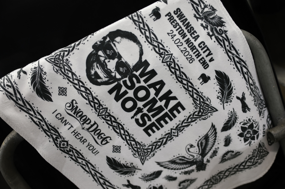 General view of a towel with Swansea City co-owner Snoop Dogg and today's match fixture on it is seen inside the stadium before the match against Preston North End at Swansea.com Stadium, Swansea, Wales February 24, 2026. — Peter Cziborra/Action Images pic via Reuters