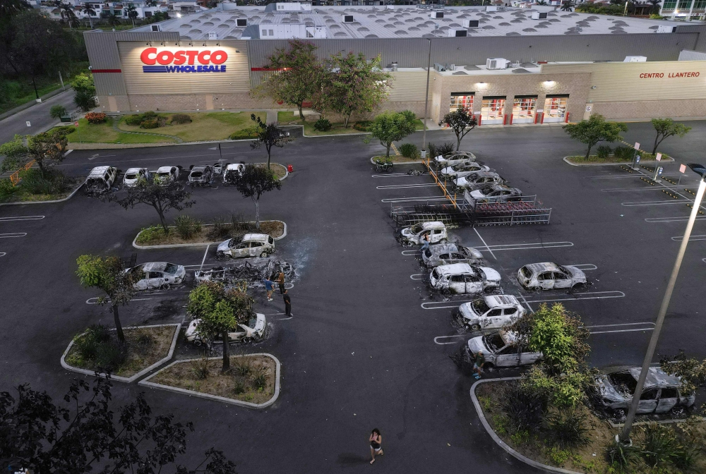 Aerial view of burned cars in the parking lot of a Costco retail store in Puerto Vallarta, Jalisco state, Mexico, on February 23, 2026. — AFP pic 