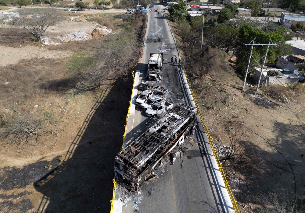 Aerial view of burned vehicles over the ‘La Desembocada’ bridge in Puerto Vallarta, Jalisco State, Mexico, on February 24, 2026. — AFP pic 