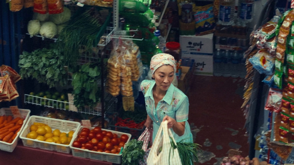 The ‘char kway teow’ hawker coming out of a ‘mamak’ sundry shop along Love Lane. — Picture courtesy of Self-Portrait